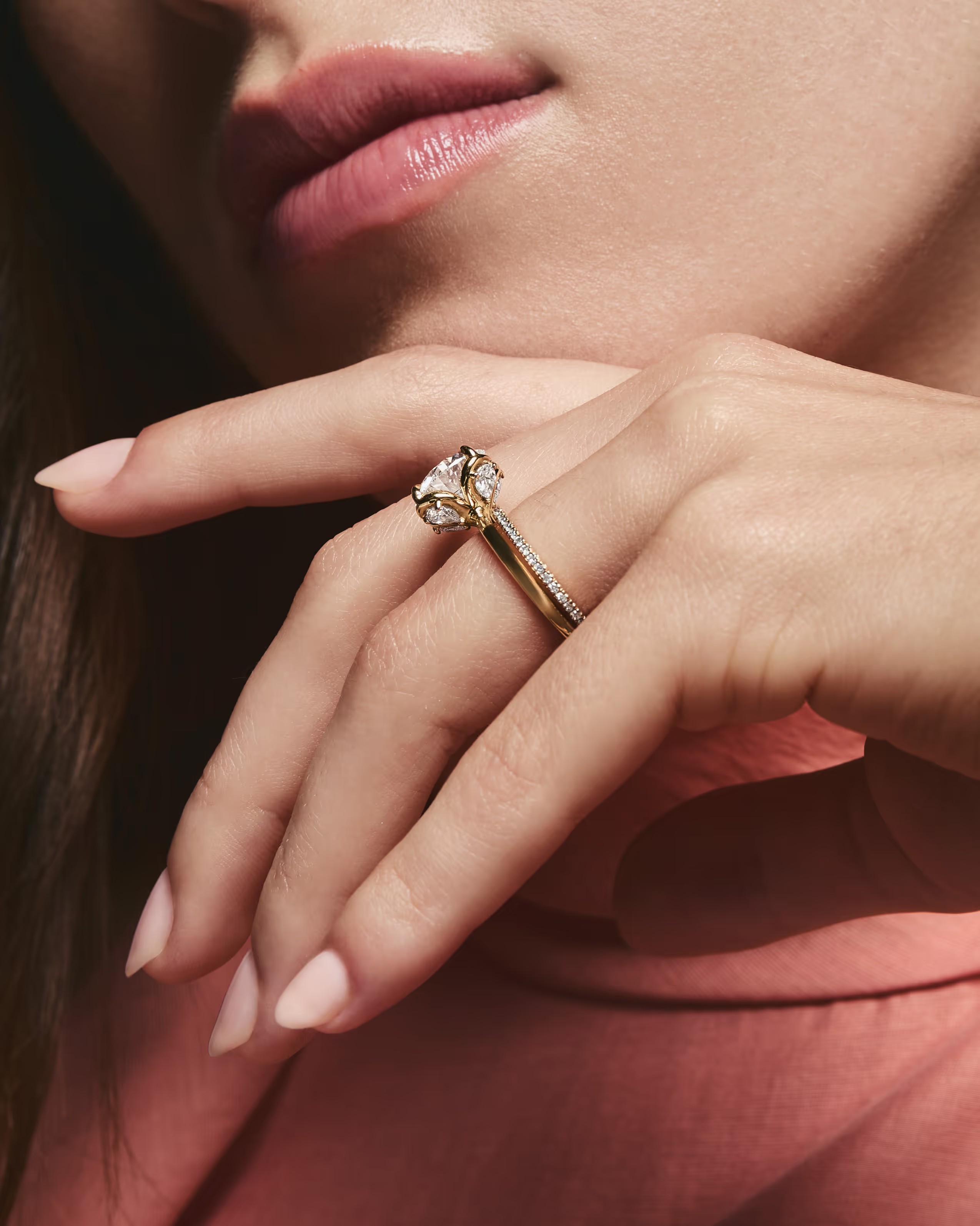 Frank Darling Buttercup ring with a round center stone in a gold-tone sculpted setting.